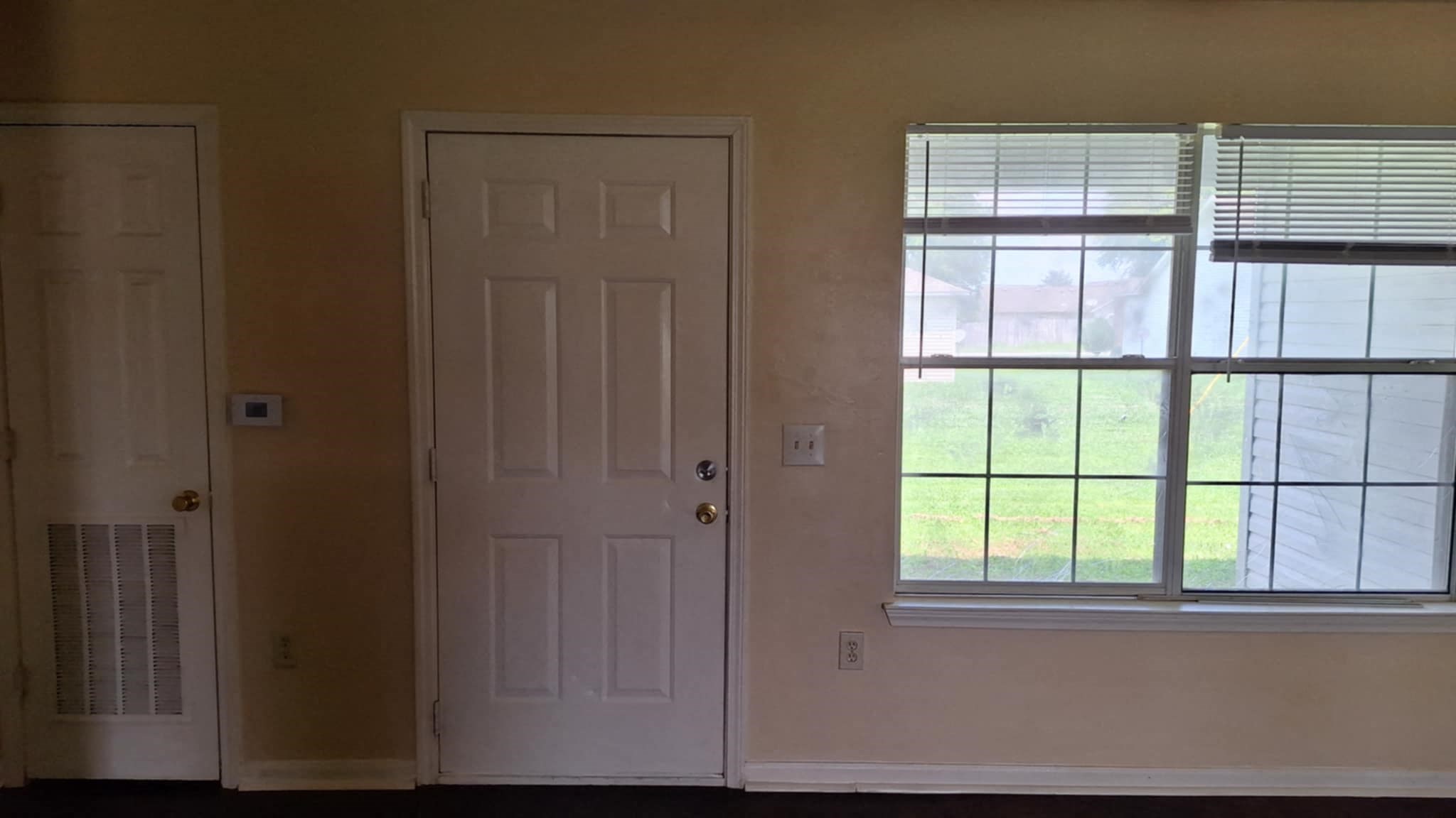 living room facing dining room/back porch